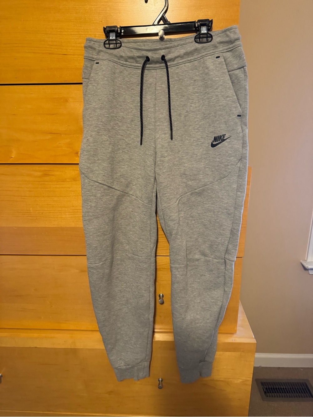 Nike Tech Light Grey Drawstring Sweatpants with Black Logo Kids S